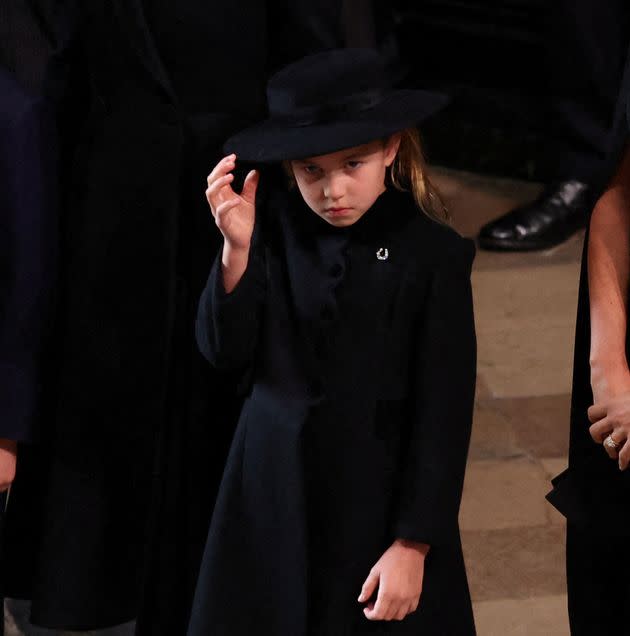 A close up of Princess Charlotte at the state funeral. The princess wore a wide-brimmed black hat, like her mother. (Photo: PHIL NOBLE via Getty Images)