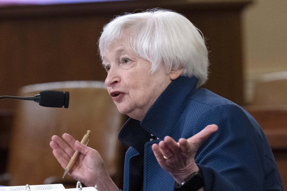 FILE - Department of the Treasury Secretary Janet Yellen testifies before the House Ways and Means Committee during a hearing on Proposed Fiscal Year 2023 Budget on Capitol Hill in Washington, June 8, 2022. The global minimum tax is aimed at making it harder for companies to dodge taxes by moving from country to country in search of lower rates, and Yellen played a leading role in negotiating the deal among 130 countries. (AP Photo/Jose Luis Magana, File)