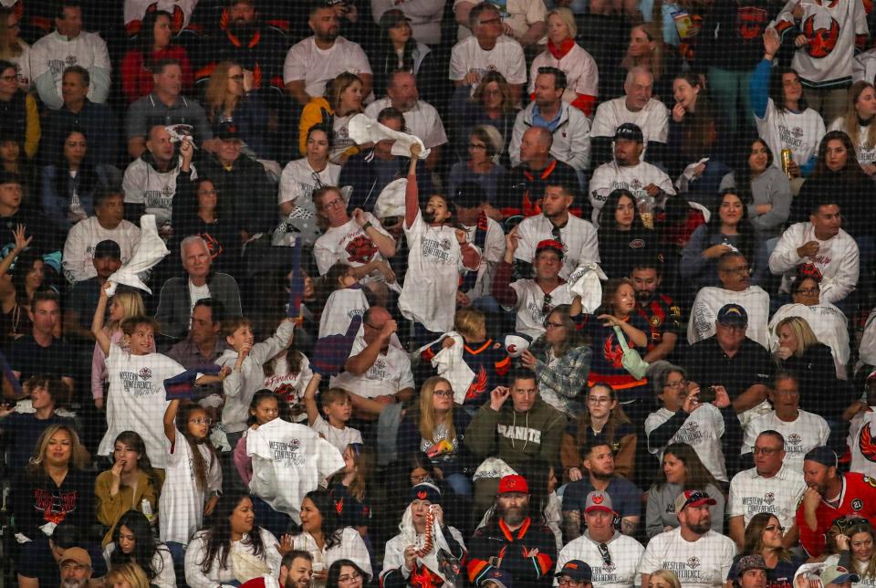 Coachella Valley Firebirds fans cheer for their team during the third period of game two of the Western Conference Finals at Acrisure Arena in Palm Desert, Calif., Saturday, May 27, 2023. 