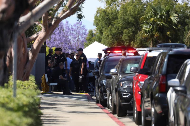 Law enforcement officers are seen after a deadly gunfire erupted at Geneva Presbyterian Church in Laguna Woods