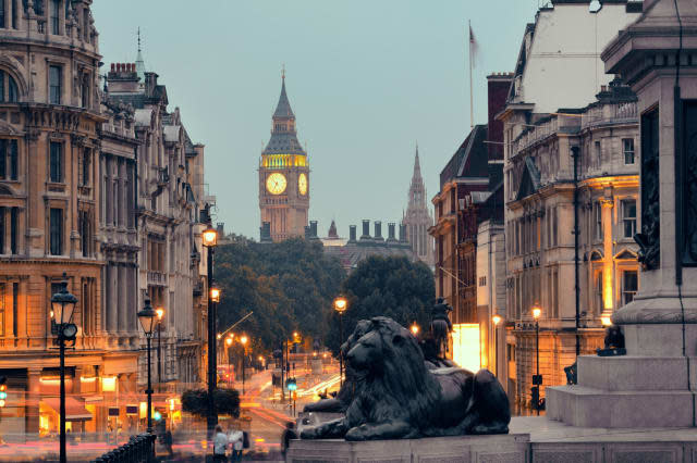 Street view of Trafalgar Square at night in London