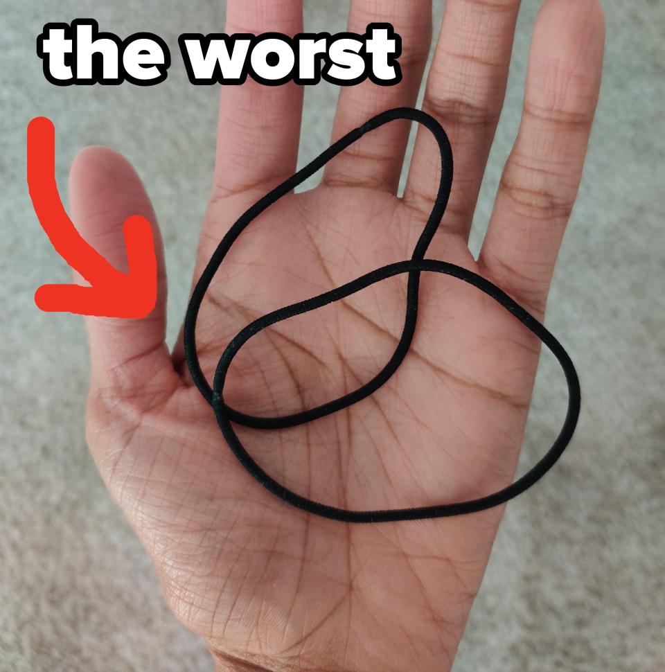 thin hair ties in the author's hand