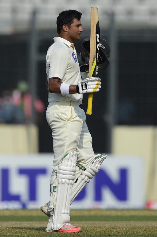 Pakistan's Azhar Ali celebrates after reaching his century on the first day of the second Test against Bangladesh in Dhaka on May 6, 2015