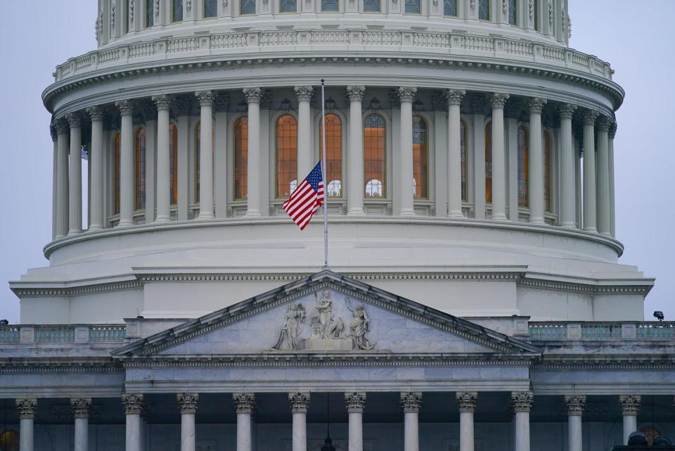 <span class="caption">The American flag flies at half-staff at the U.S. Capitol in Washington on May 14, 2022, after President Biden ordered flags lowered to commemorate 1 million American dead due to COVID-19. </span> <span class="attribution"><a class="link " href="https://newsroom.ap.org/detail/VirusOutbreakMillionDead/e40b80c5ee2248efb0513731a5cc7532/photo?Query=1%20million%20dead%20COVID&mediaType=photo&sortBy=creationdatetime:desc&dateRange=Anytime&totalCount=20&currentItemNo=0" rel="nofollow noopener" target="_blank" data-ylk="slk:AP Photo/Pablo Martinez Monsivais;elm:context_link;itc:0;sec:content-canvas">AP Photo/Pablo Martinez Monsivais</a></span>