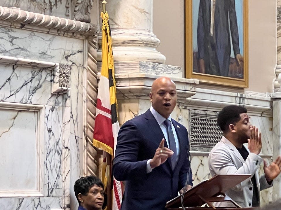 Maryland Gov. Wes Moore, a Democrat, speaks at the speaker's rostrum during his second State of the State address in Annapolis on Feb. 7, 2024 while Maryland Speaker of the House of Delegates Adrienne Jones, D-Baltimore County, listens in the background.