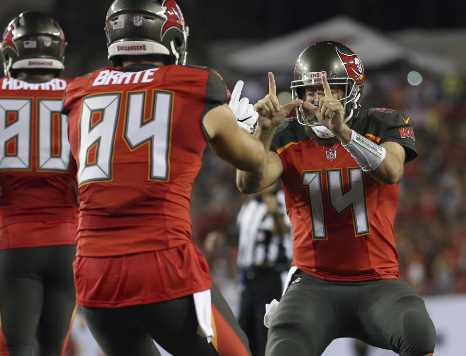 Ryan Fitzpatrick celebrates a touchdown during Monday night’s game against the Steelers. (AP)