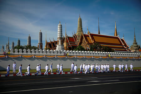 Officials walk past the Grand Palace during the coronation of King Maha Vajiralongkorn in Bangkok, Thailand, May 4, 2019. REUTERS/Navesh Chitrakar