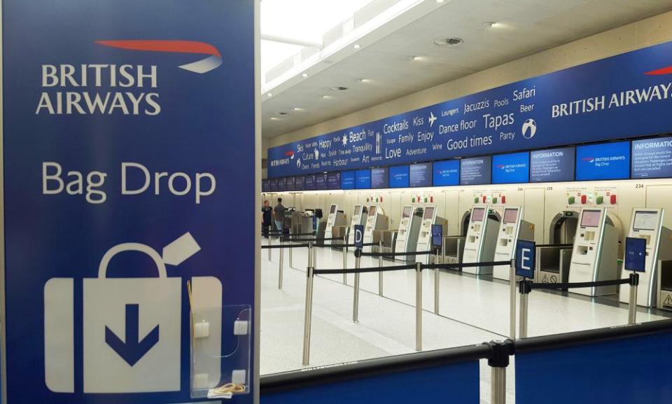 An empty bank of British Airways check-in desks at Gatwick airport