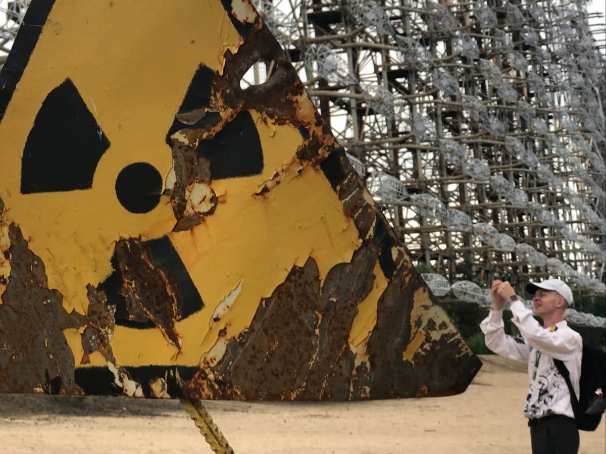 Exclusion zone: a tourist at the radar array close to the Chernobyl nuclear reactor, which will be off limits initially  (Simon Calder)