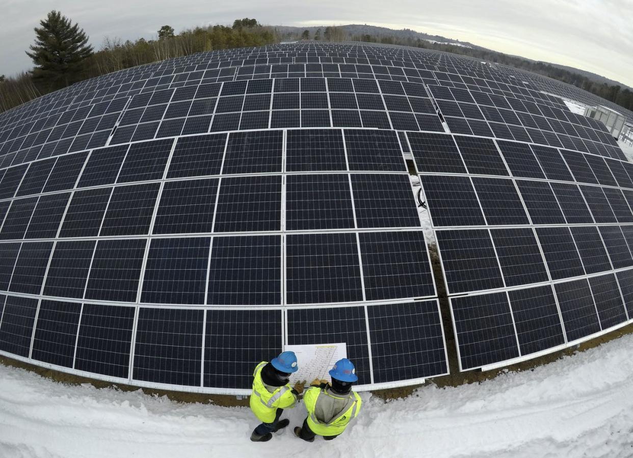 <span class="caption">Energy storage can make facilities like this solar farm in Oxford, Maine, more profitable by letting them store power for cloudy days.</span> <span class="attribution"><a class="link " href="https://newsroom.ap.org/detail/BidenRenewables/8521ad964886489ab3f679636d564ddb/photo" rel="nofollow noopener" target="_blank" data-ylk="slk:AP Photo/Robert F. Bukaty;elm:context_link;itc:0;sec:content-canvas">AP Photo/Robert F. Bukaty</a></span>