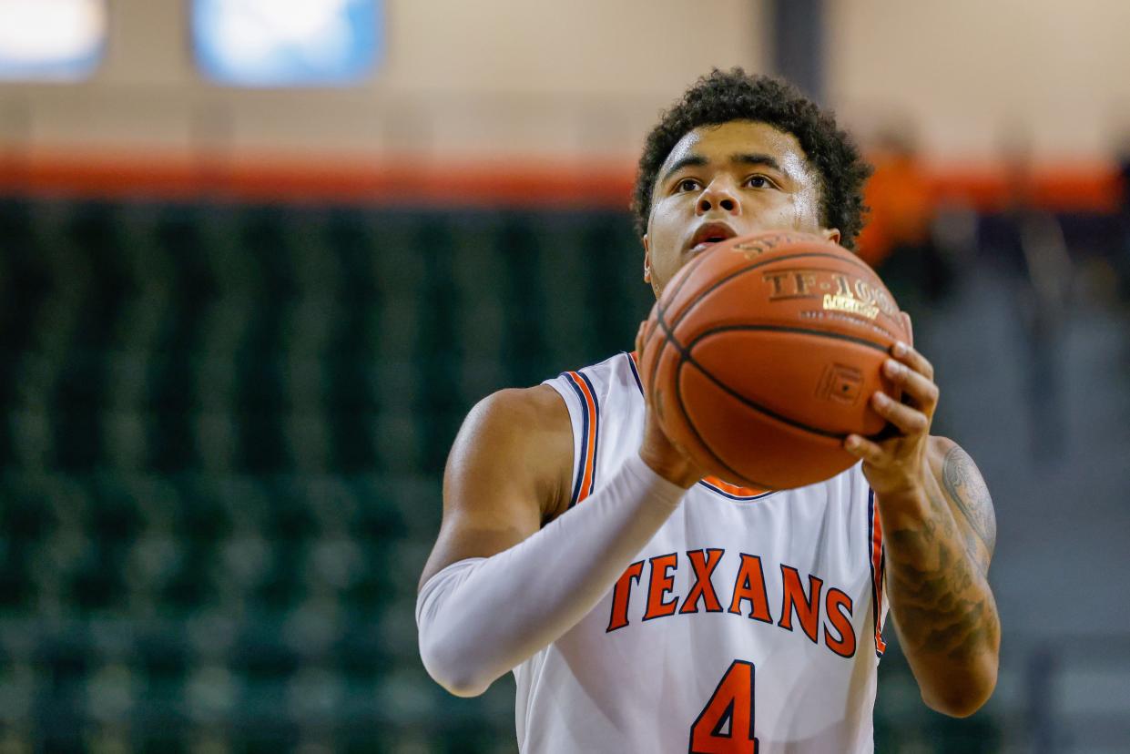 South Plains College guard Kieves Turner, shown in a game earlier this season, scored 31 points Saturday to lead the Texans to an 87-83 upset of Odessa College in the NJCAA Region V tournament championship game.