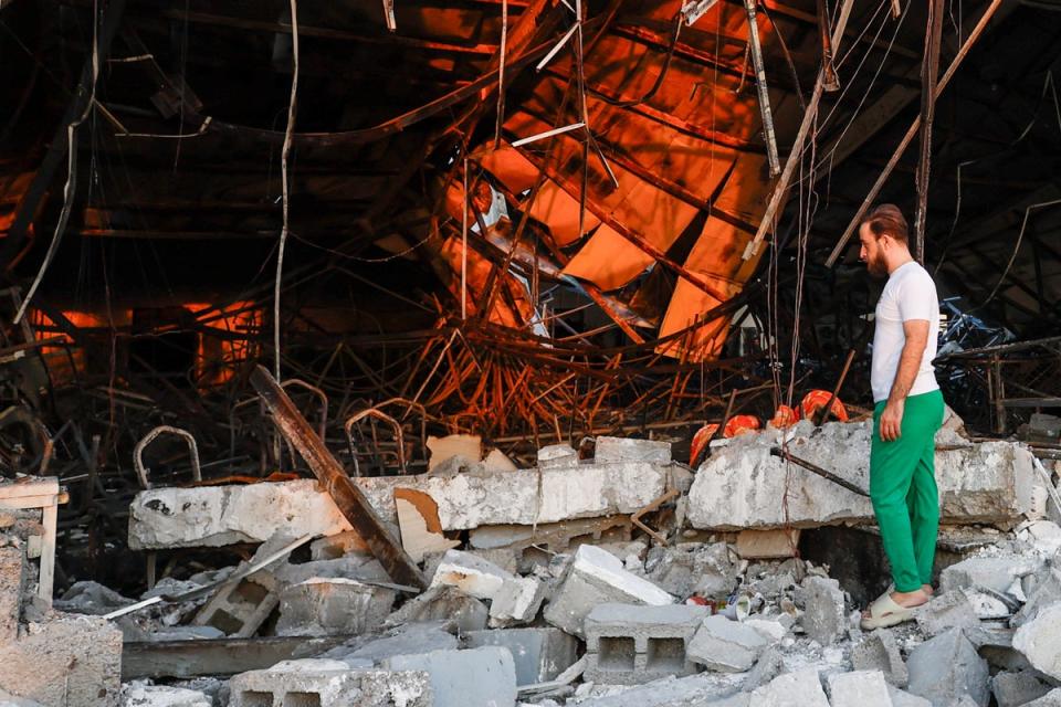 The wedding hall was reduced to charred metal and rubble (REUTERS)