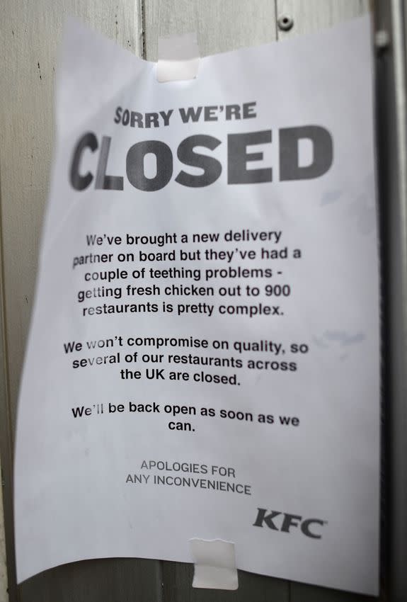 A sign outside a closed KFC fast food store in south London is closed on Feb. 19 explains the closure is due to a shortage of fresh chicken.