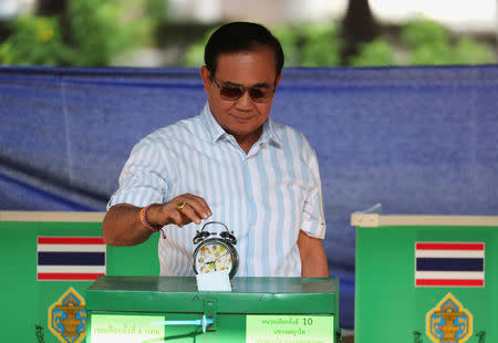 Thailand's Prime Minister Prayuth Chan-ocha casts his ballot to vote in the general election at a polling station in Bangkok, Thailand, March 24, 2019. REUTERS/Athit Perawongmetha