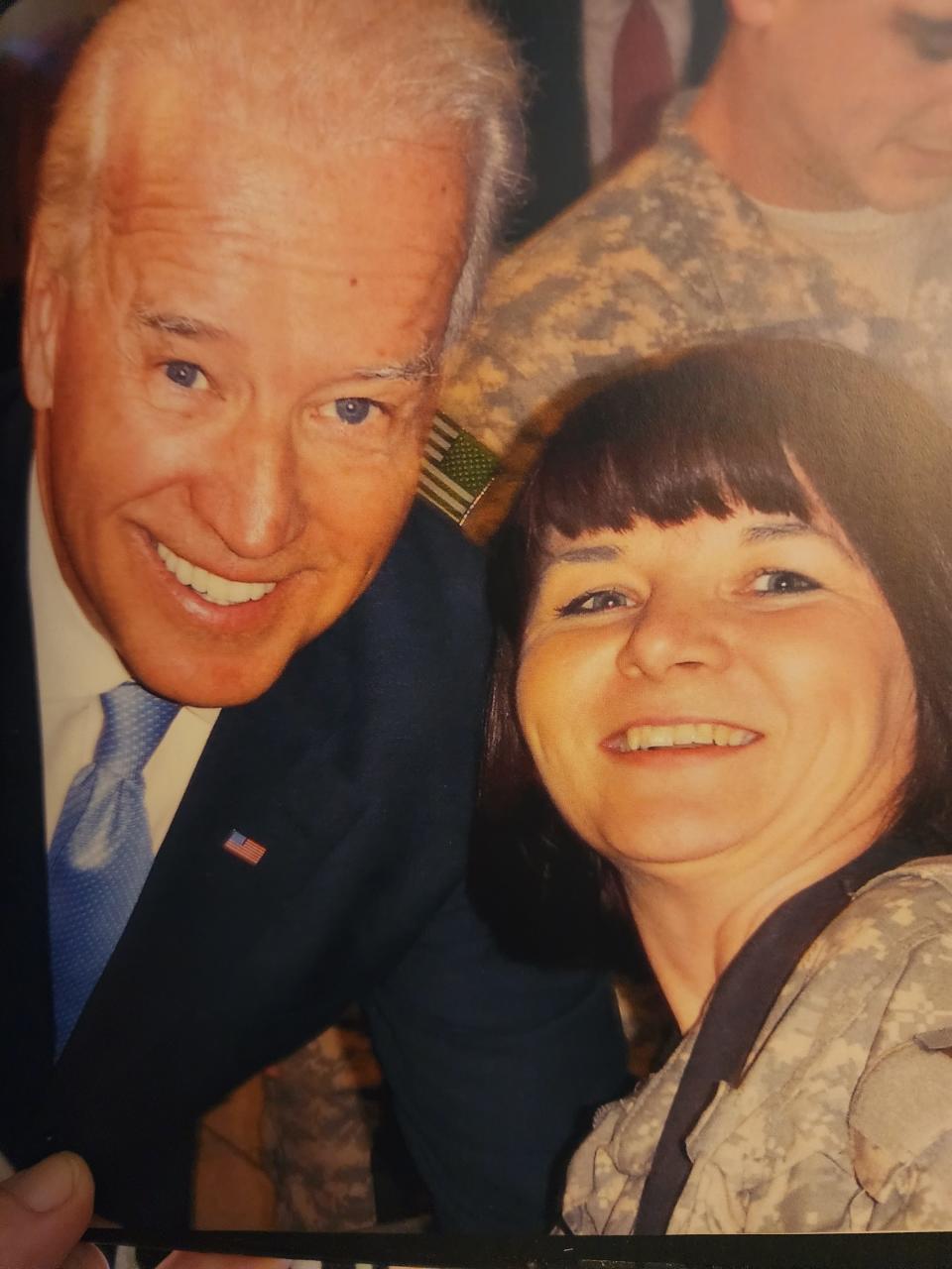 Master Sgt. Helen Miller of the Michigan National Guard is pictured with then-Vice President Joe Biden during her deployment in 2010-11 to Afghanistan.