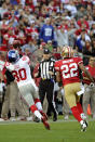 SAN FRANCISCO - NOVEMBER 13: Victor Cruz #80 of the New York Giants catches this thirty six yard pass over Carlos Rogers #22 of the San Francisco 49ers during an NFL football game at Candlestick Park November 13, 2011 in San Francisco, California. The 49ers won the game 27-20. (Photo by Thearon W. Henderson/Getty Images)