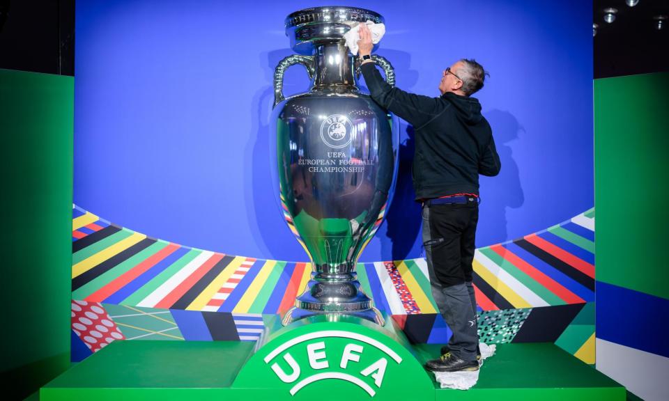 <span>A giant replica of the Euro 2024 trophy in Hamburg, but across Germany there is little visible footprint of the tournament.</span><span>Photograph: Marvin Ibo Guengoer/GES Sportfoto/Getty Images</span>