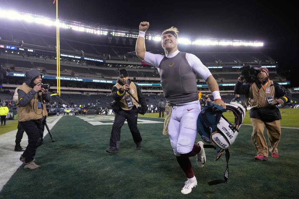 Washington Commanders quarterback Taylor Heinicke celebrates after an NFL football game against the Philadelphia Eagles, Monday, Nov. 14, 2022, in Philadelphia. The commanders won 32-21. (AP Photo/Matt Rourke)