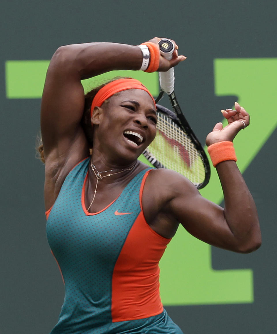 Serena Williams, of the United States, returns to Caroline Garcia, of France, at the Sony Open tennis tournament in Key Biscayne, Fla., Saturday, March 22, 2014. (AP Photo/Alan Diaz)