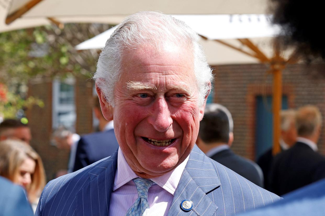 Britain's Prince Charles, Prince of Wales talks with people as he visits the high street in Clapham Old Town, south London on May 27, 2021. (Photo by Heathcliff O'Malley / POOL / AFP) (Photo by HEATHCLIFF O'MALLEY/POOL/AFP via Getty Images)