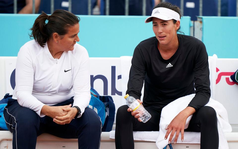 Garbine Muguruza talks with her coach Conchita Martinez during a training session during the Mutua Madrid Open in 2022 - Quality Sport Images/Getty Images