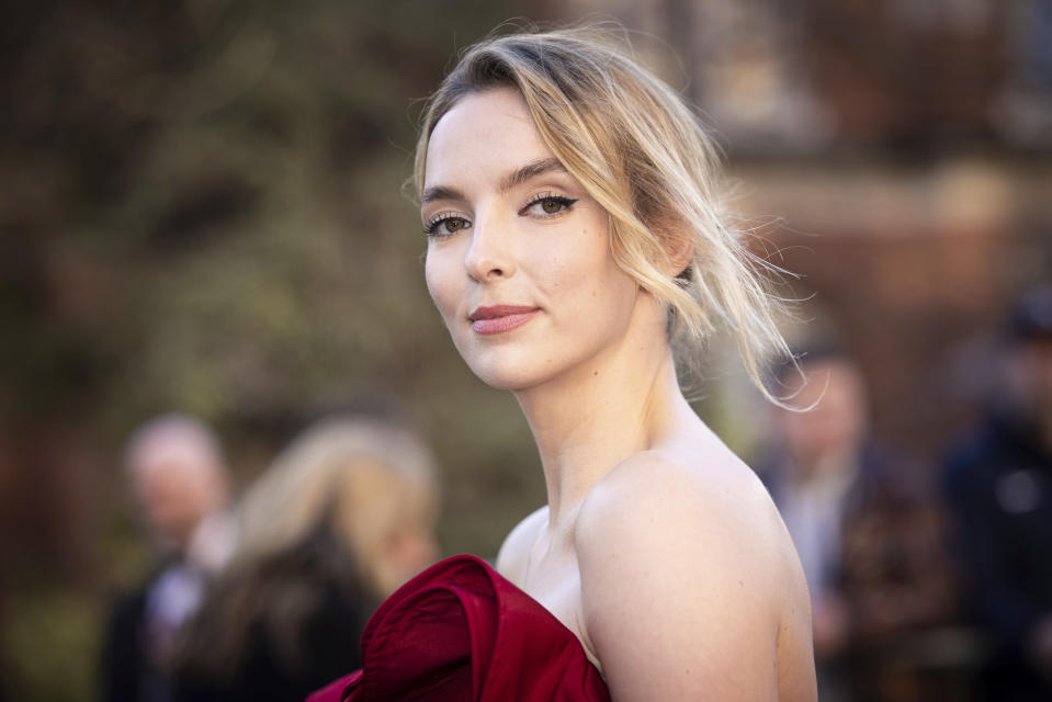 Jodie Comer poses for photographers upon arrival at the Olivier Awards in London, Sunday, April 2, 2023. (Photo by Vianney Le Caer/Invision/AP)