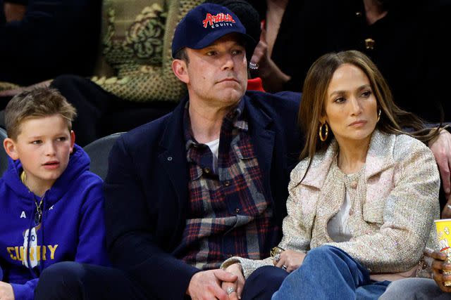 <p>Kevork Djansezian/Getty</p> Jennifer Lopez, Ben Affleck and his son Samuel Garner Affleck attend a basketball game between the Los Angeles Lakers and Golden State Warriors on March 16, 2024 in Los Angeles, California.