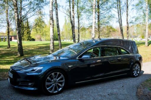 "Many people drive an electric car in Norway and some want to leave this planet in a green way," says undertaker Odd Borgar Jolstad, demonstrating his Tesla hearse in the tranquil Grefsen cemetery overlooking the capital