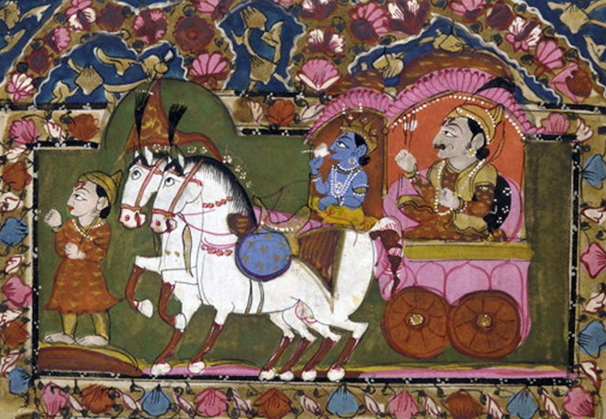 This famous scene from the Bhagavad Gita, featuring the god Krishna with his cousin, Prince Arjuna, on a chariot heading into war. <a href="https://www.gettyimages.com/detail/news-photo/this-famous-scene-from-hindu-mythology-features-the-god-news-photo/1354436400?adppopup=true" rel="nofollow noopener" target="_blank" data-ylk="slk:Pictures From History/Universal Images Group via Getty Images;elm:context_link;itc:0;sec:content-canvas" class="link ">Pictures From History/Universal Images Group via Getty Images</a>