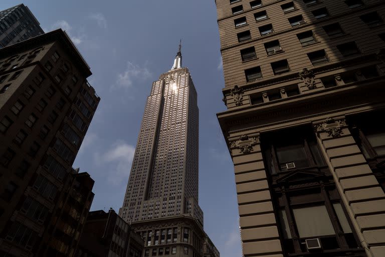 The Empire State Building, in midtown Manhattan, August 10, 2021. It once symbolized an urban way of working, and the cityÕs resilience. In the pandemicÕs second year, the future of the worldÕs most famous skyscraper is in doubt. (Todd Heisler/The New York Times)

