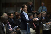 FILE - Myanmar's leader Aung San Suu Kyi addresses judges of the International Court of Justice for the second day of three days of hearings in The Hague, Netherlands on Dec. 11, 2019. Myanmar court on Monday, Dec. 6, 2021, sentenced ousted leader Suu Kyi to 4 years for incitement and breaking virus restrictions, then later in the day state TV announced that the country's military leader reduced the sentence by two years. (AP Photo/Peter Dejong, File)