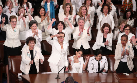 Democratic female members of Congress cheer after President Donald Trump said there are more women in Congress than ever before during his second State of the Union address to a joint session of Congress at the U.S. Capitol in Washington, U.S. February 5, 2019. REUTERS/Jonathan Ernst