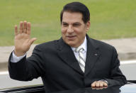 FILE - In this Oct.11, 2009 file photo, then Tunisian President Zine El Abidine Ben Ali waves from his car at a campaign rally in Rades, outside Tunis. On Thursday Jan. 14, 2021, Tunisia commemorates 10-years since the flight into exile of its iron-fisted leader, Zine El Abidine Ben Ali, pushed from power in a popular revolt that foreshadowed the so-called Arab Spring, but without festive celebrations because of the coronavirus lockdown. (AP Photo/Hassene Dridi, File)