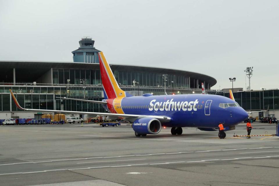 <p>Bruce Bennett/Getty</p> An view of a Southwest airlines jet as photographed at Laguardia Airport on November 10, 2018 in New York City.