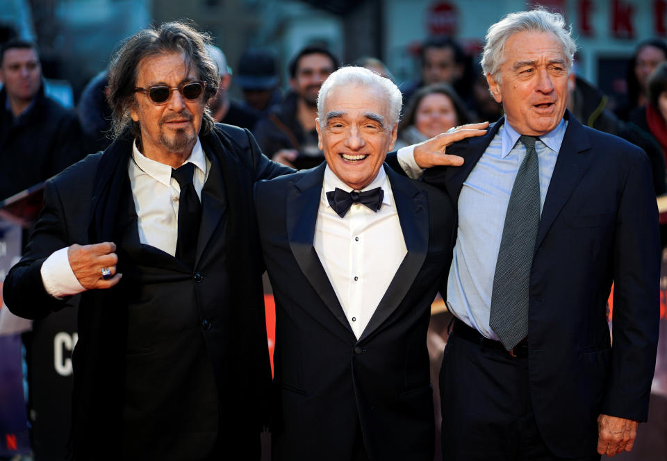 Director Martin Scorsese and cast members Al Pacino and Robert De Niro pose as they arrive for the screening of "The Irishman" during the 2019 BFI London Film Festival at the Odeon Luxe Leicester Square in London, Britain October 13, 2019. REUTERS/Henry Nicholls     TPX IMAGES OF THE DAY