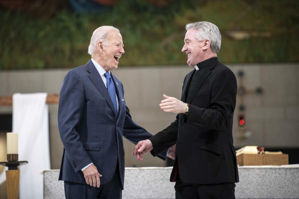 Image: President Joe Biden visits Knock Shrine and Basilica with Fr. Richard Gibbons on April 14, 2023 in Dublin. (Julien Behal / Irish Government via Getty Images)