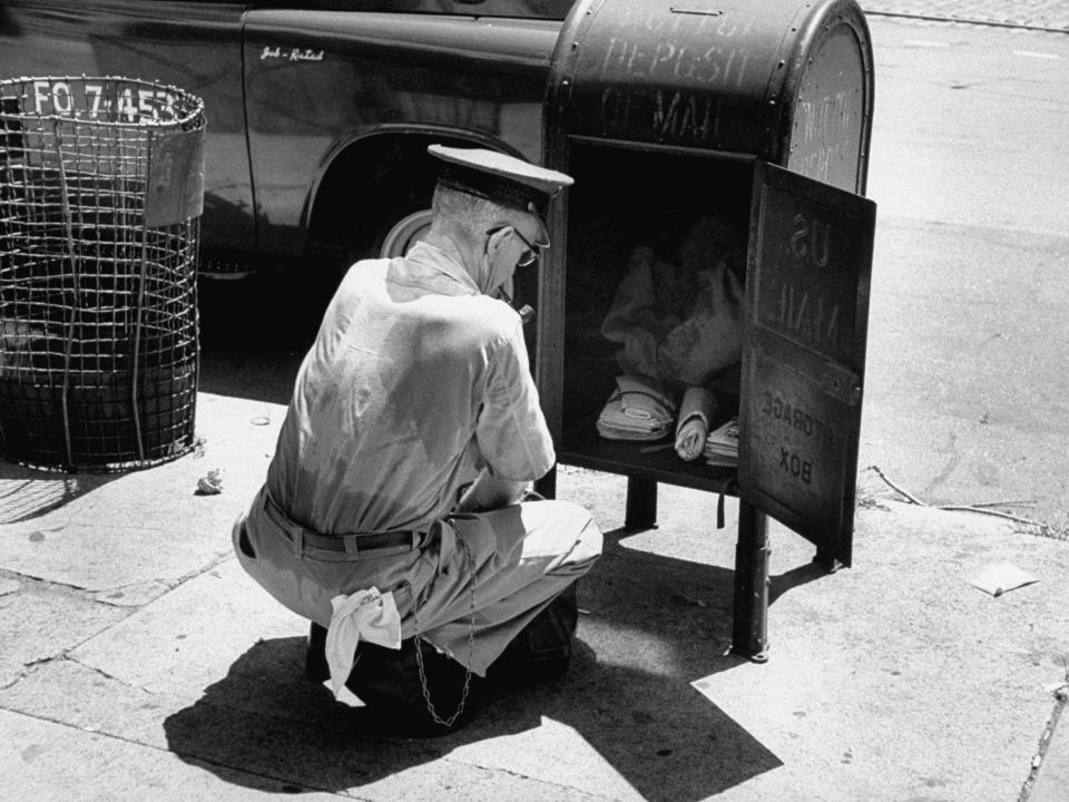 A postal worker during the summer in 1954