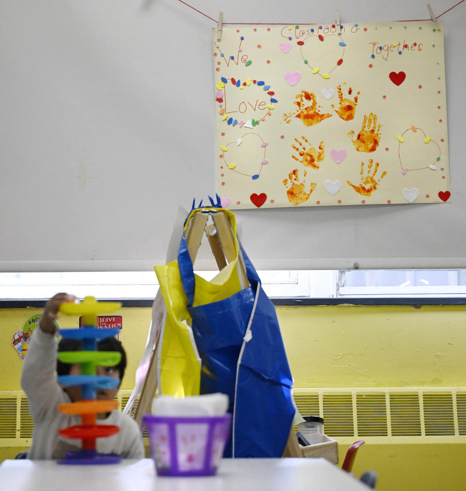 A child plays at a Head Start program at Alliance for Community Empowerment, Thursday, Sept. 28, 2023, in Bridgeport, Conn. Head Start programs serving more than 10,000 disadvantaged children would immediately lose federal funding if there is a federal shutdown, although they might be able to stave off immediate closure if it doesn't last long. (AP Photo/Jessica Hill)