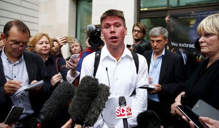 Lauri Love speaks to members of the media as he leaves after attending his extradition hearing at Westminster Magistrates' Court in London, Britain September 16, 2016. REUTERS/Peter Nicholls