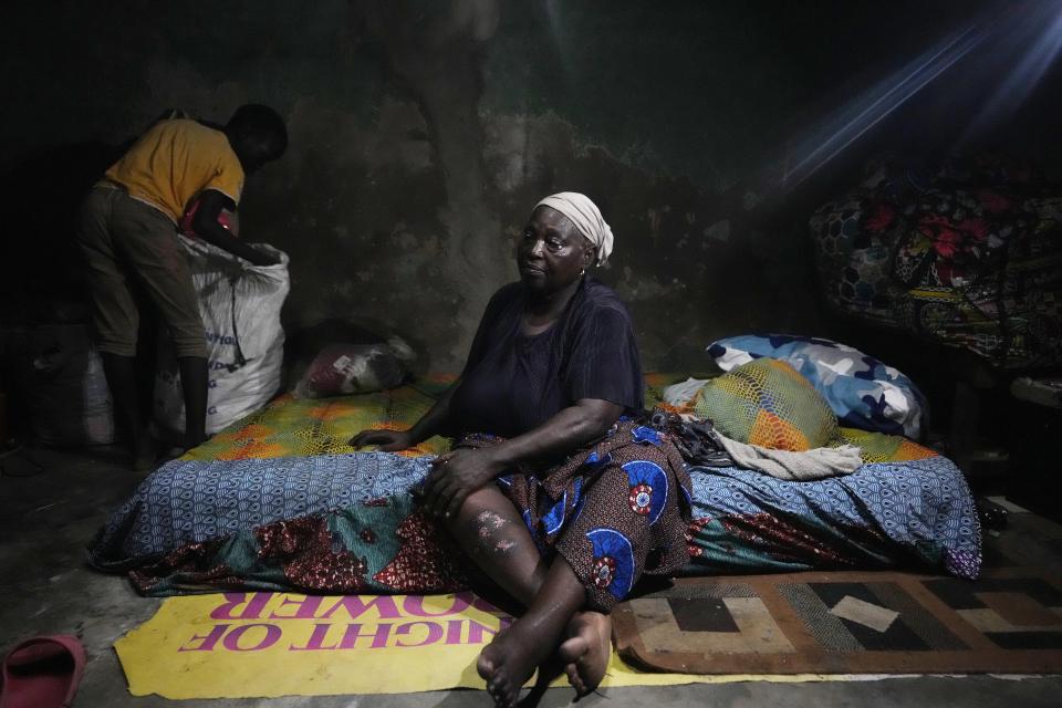 Funmilayo Kotun, 66-years-old, a malaria patient is photographed in her one room in Makoko neighbourhood of Lagos, Nigeria, Saturday, April 20, 2024. When cases of locally transmitted malaria were found in the United States last year, it was a reminder that climate change is reviving the threat, or broadening the range, of some diseases. But across the African continent malaria has never left.(AP Photo/Sunday Alamba)