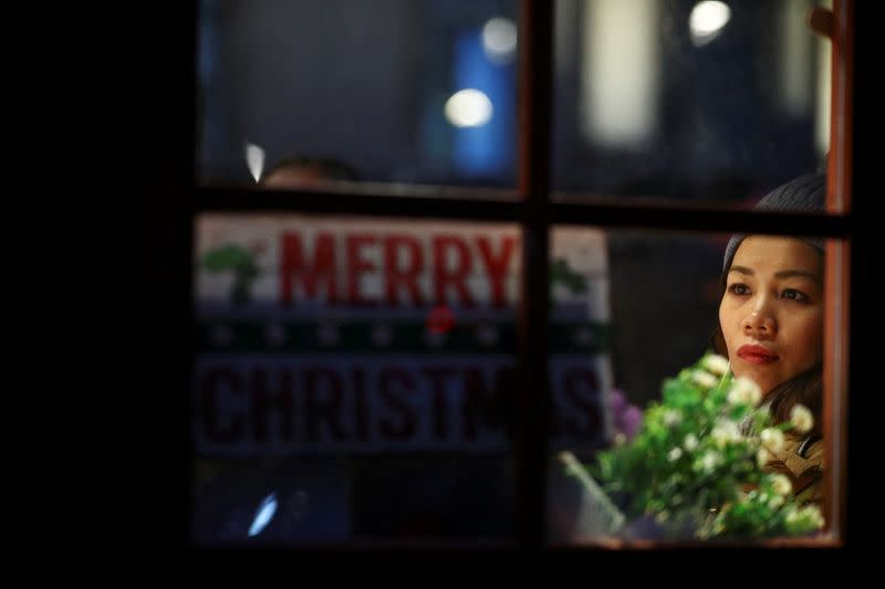 People visit a Christmas market in London