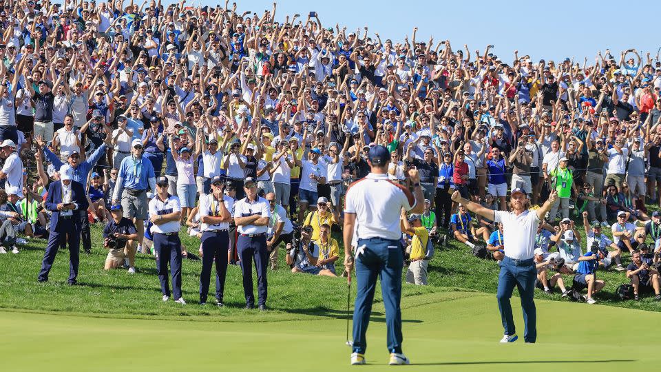 McIlroy and Fleetwood (right) toast another win together. - David Cannon/Getty Images