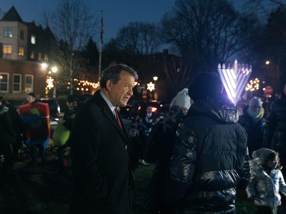 Latimer at a menorah lighting in White Plains, New York in December.