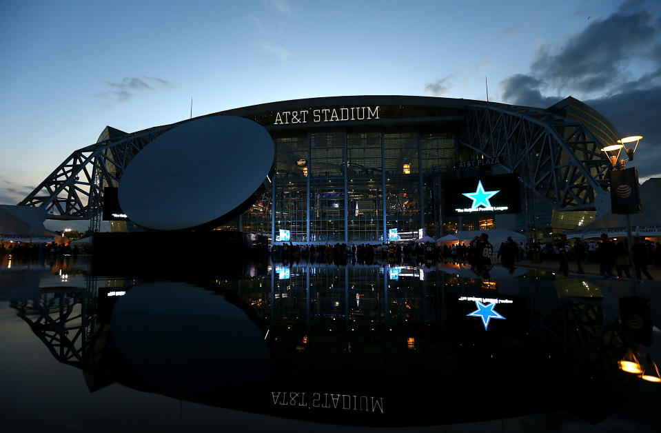 About 100 people protested police shooting deaths in Dallas on Sunday night outside of AT&T Stadium before the Cowboys’ Sunday Night Football game. (Getty Images)