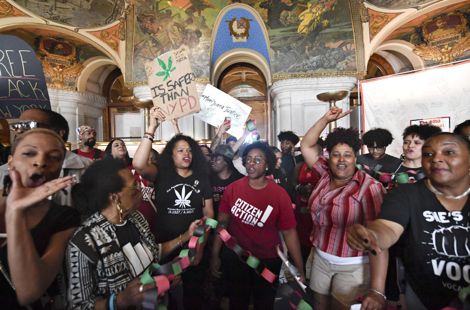 A coalition of protesters from VOCAL NY, and Citizen Action urge legislators to pass legalization of Marijuana legislation at the state Capitol Wednesday, June 19, 2019, in Albany, N.Y. A push to legalize recreational marijuana in New York state has failed after state leaders did not reach a consensus on several key details in the final days of the legislative session. (AP Photo/Hans Pennink)