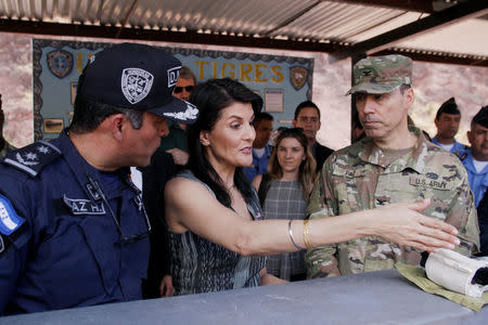 U.S. Ambassador to the United Nations Nikki Haley chats with trainers of the COBRAS, Honduras National Police Special Forces, at their base in Tegucigalpa, Honduras February 27, 2018. REUTERS/Jorge Cabrera