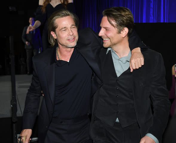 Kevin Mazur/Getty Brad Pitt and Bradley Cooper