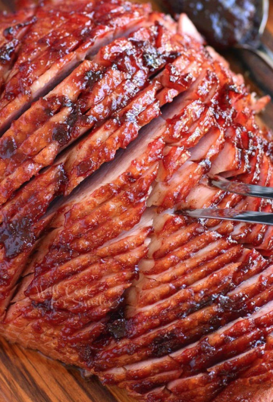 <p>Will Cook for Smiles</p><p>This cherry ham glaze is made with cherry preserves, fresh lemon juice and aromatic spices. It’s truly a beautiful centerpiece for your holiday table.</p><p><strong>Get the recipe: <a href="https://www.willcookforsmiles.com/baked-ham-with-cherry-ham-glaze/" rel="nofollow noopener" target="_blank" data-ylk="slk:Cherry Glazed Baked Ham;elm:context_link;itc:0;sec:content-canvas" class="link rapid-noclick-resp">Cherry Glazed Baked Ham</a></strong></p>