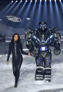 <p>Irina Shayk walks hand-in-hand with Philipp Plein’s Transformers robot. (Photo: Getty) </p>