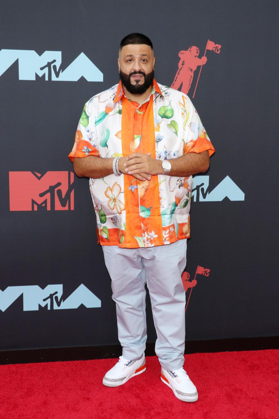 <h1 class="title">DJ Khaled</h1><cite class="credit">Photo: Getty Images</cite>